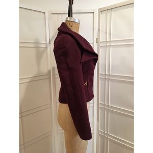 Burgundy wool zip up jacket.